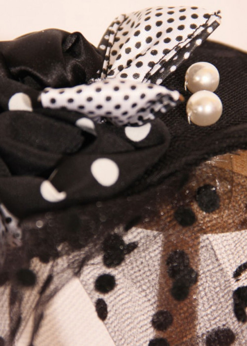Black satin fascinator hat in teardrop shape with tulle 