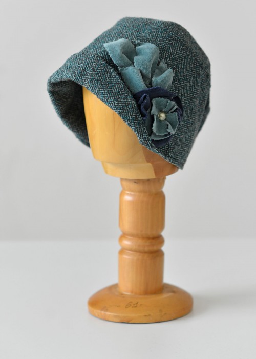 Turquoise wool herringbone cloche hat with flower detail